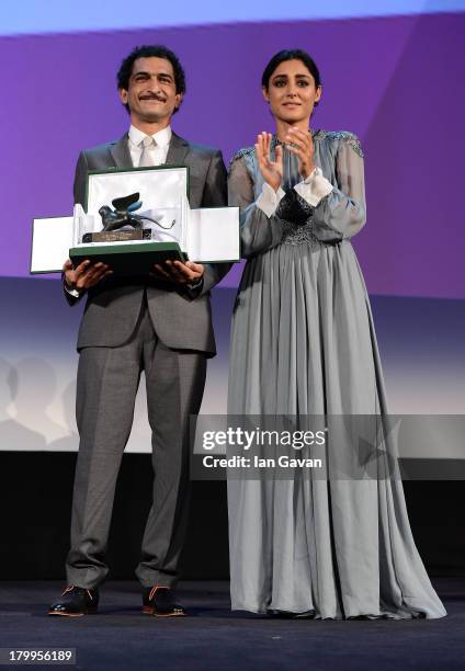 Orizzonti Jury member Iranian actress Golshifteh Farahani wears a Jaeger-LeCoultre Vintage Couvercle watch as she stands with Orizzonti Jury member...