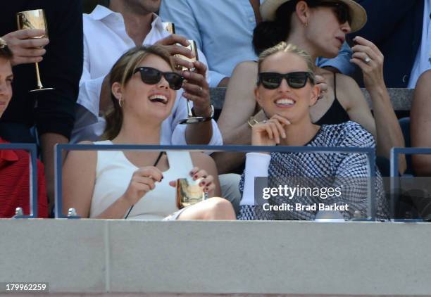 Model Kate Upton and Karolina Kurkova attend The Moet & Chandon Suite at USTA Billie Jean King National Tennis Center on September 7, 2013 in New...