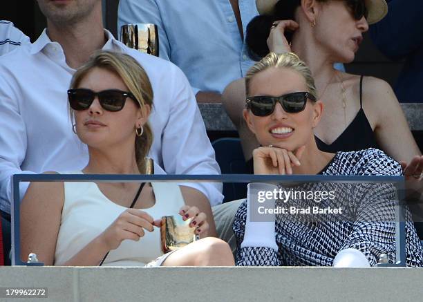 Model Kate Upton and Karolina Kurkova attend The Moet & Chandon Suite at USTA Billie Jean King National Tennis Center on September 7, 2013 in New...