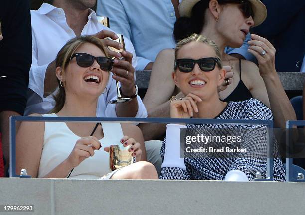 Model Kate Upton and Karolina Kurkova attend The Moet & Chandon Suite at USTA Billie Jean King National Tennis Center on September 7, 2013 in New...