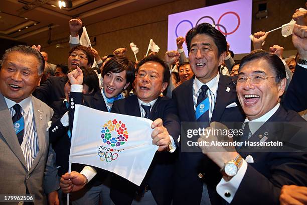 Tokyo 2020 CEO Masato Mizuno, Prime Minister of Japan Shinzo Abe, Governor of Tokyo, Naoki Inose and 'Cool Tokyo' Ambassador Christel Takigawa...