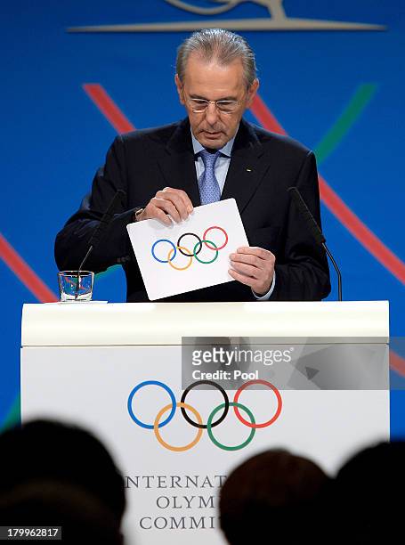 International Olympic Committee President Jacques Rogge pulls out the name of the city of Tokyo elected to host the 2020 Summer Olympics during a...