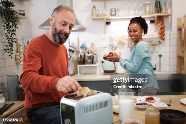 347 Guy Using Toaster Stock Photos, High-Res Pictures, and Images ...