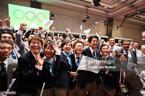 Tokyo 2020 CEO Masato Mizuno , Prime Minister of Japan Shinzo Abe , Governor of Tokyo, Naoki Inose and 'Cool Tokyo' Ambassador Christel Takigawa...