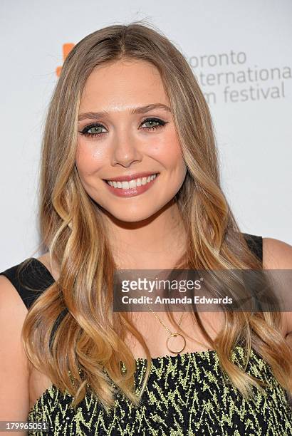 Actress Elizabeth Olsen attends the "Therese" premiere during the 2013 Toronto International Film Festival at Isabel Bader Theatre on September 7,...