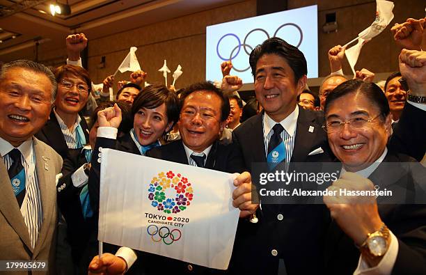Tokyo 2020 CEO Masato Mizuno, Prime Minister of Japan Shinzo Abe, Governor of Tokyo, Naoki Inose and 'Cool Tokyo' Ambassador Christel Takigawa...