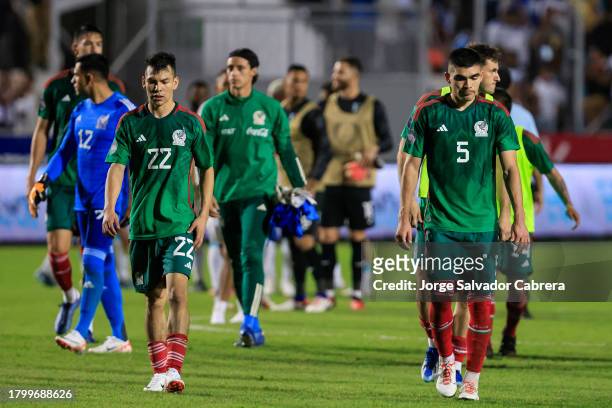 Hirving Lozano and Johan Vasquez of Mexico leave the field after a defeat the CONCACAF Nations League quarterfinals first leg match between Honduras...