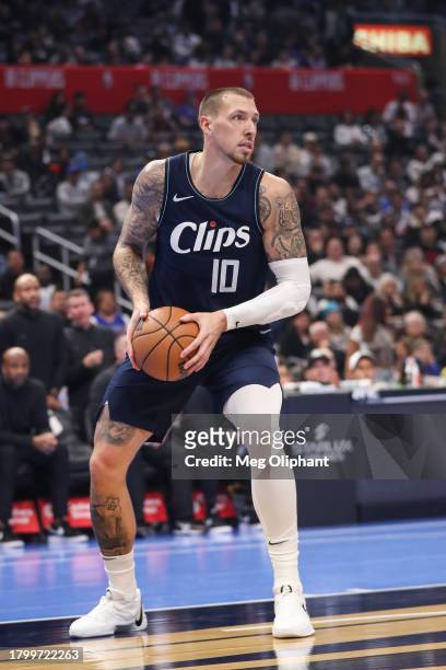 Daniel Theis of the Los Angeles Clippers handles the ball in his debut against the Houston Rockets in the first quarter of an NBA In-Season...