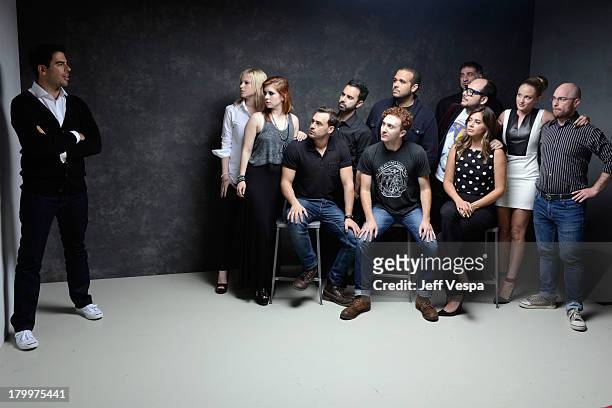 Director Eli Roth with the cast and crew of 'The Green Inferno' pose at the Guess Portrait Studio during 2013 Toronto International Film Festival on...