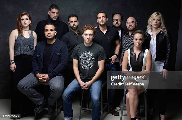 The cast and crew of 'The Green Inferno' pose at the Guess Portrait Studio during 2013 Toronto International Film Festival on September 7, 2013 in...