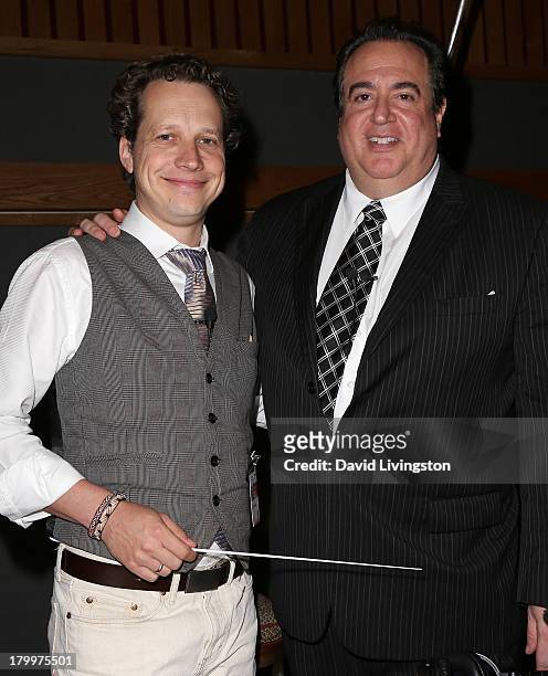 Composer Chris Walden and songwriter Nick Vallelonga attend a recording session for the single "New York City Christmas" sung by actor Robert Davi at...