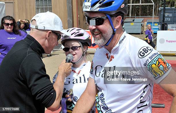 Gwen Desepte and Chuck Desepte arrive at the finish line of the Best Buddies Challenge: Hearst Castle Ride to Finish at Hearst Castle on September 7,...