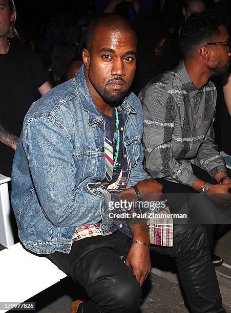 Musician Kanye West attends the Alexander Wang show during Spring 2014 Mercedes-Benz Fashion Week at Pier 94 on September 7, 2013 in New York City.