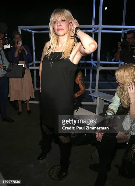 Musician Courtney Love attends the Alexander Wang show during Spring 2014 Mercedes-Benz Fashion Week at Pier 94 on September 7, 2013 in New York City.