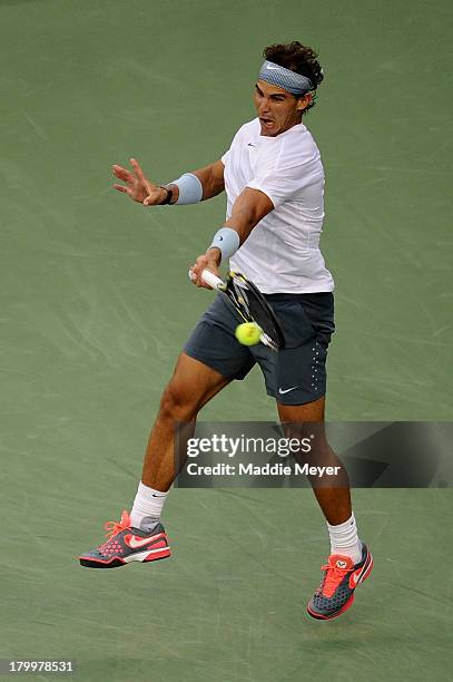 Rafael Nadal of Spain plays a forehand during his men's singles semifinal match against Richard Gasquet of France on Day Thirteen of the 2013 US Open...