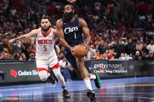 James Harden of the LA Clippers drives with the ball against Fred VanVleet of the Houston Rockets in the fourth period during an NBA In-Season...
