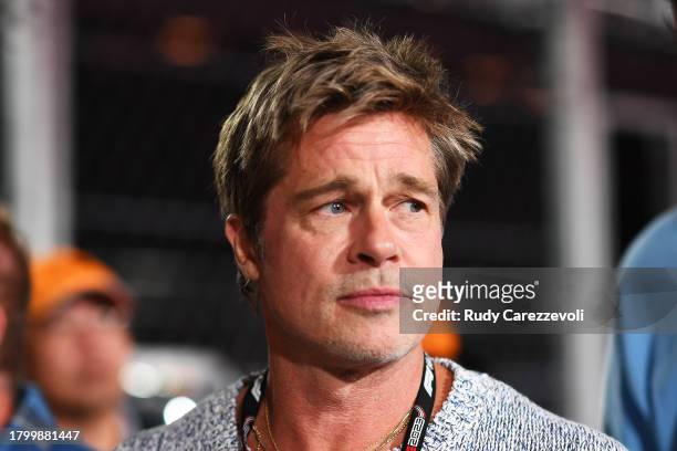 Brad Pitt, star of the upcoming Formula One based movie, Apex, walks in the Pitlane prior to qualifying ahead of the F1 Grand Prix of Las Vegas at...