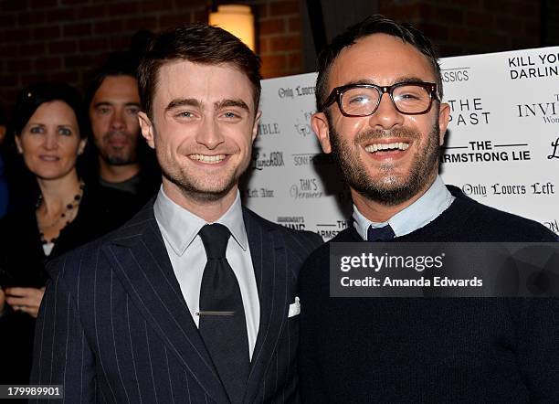 Actor Daniel Radcliffe and director John Krokidas attend the Sony Pictures Classics' cast dinner during the 2013 Toronto International Film Festival...