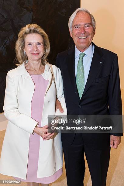 Karine Berger and husband Roland Berger attend the Georg Baselitz exhibition preview and dinner at Thaddeus Ropac Gallery on September 7, 2013 in...