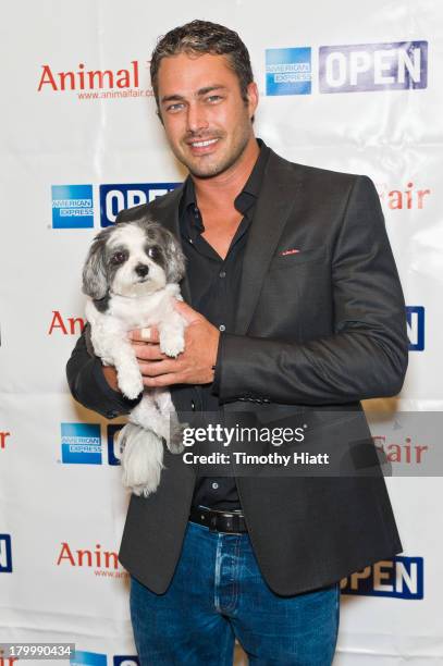 Actor Taylor Kinney attends Animalfair.com’s Bark Business tour to support K9s for Warriors event at Omni Hotel on September 7, 2013 in Chicago,...