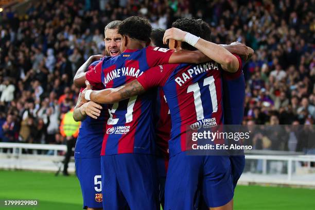 Robert Lewandowski of FC Barcelona celebrates with his teammates after scoring the team's second goal during the LaLiga EA Sports match between FC...