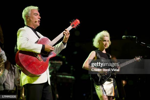 David Byrne and St. Vincent aka Annie Clark perform on stage at L'Auditori on September 7, 2013 in Barcelona, Spain.