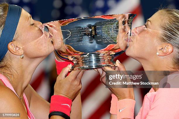 Andrea Hlavackova of Czech Republic and Lucie Hradecka of Czech Republic kiss the trophy after winning their women's doubles final match against...