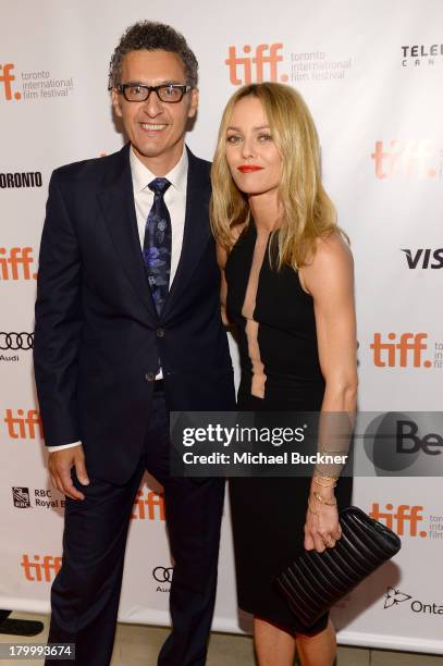 Director/actor John Turturro and Actress Vanessa Paradis arrive at the "Fading Gigolo" premiere during the 2013 Toronto International Film Festival...