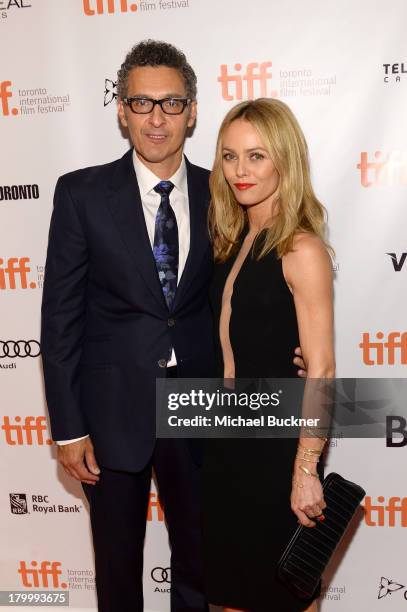 Director/actor John Turturro and Actress Vanessa Paradis arrive at the "Fading Gigolo" premiere during the 2013 Toronto International Film Festival...