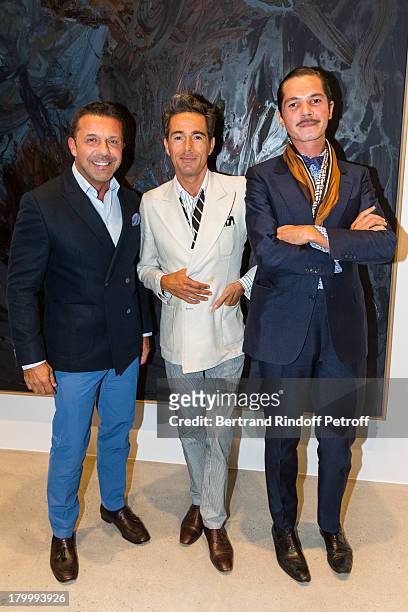 Olivier Picasso, Vincent Darre and Elie Top attend the Georg Baselitz exhibition preview and dinner at Thaddeus Ropac Gallery on September 7, 2013 in...