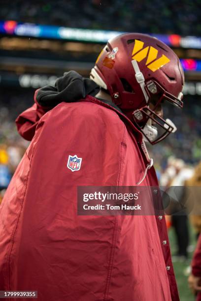 Cornelius Lucas of the Washington Commanders stands on the field against the Seattle Seahawks at Lumen Field on November 12, 2023 in Seattle,...
