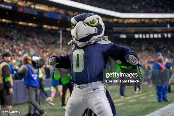 Blitz the mascot of the Seattle Seahawks cheers against the Washington Commanders at Lumen Field on November 12, 2023 in Seattle, Washington.