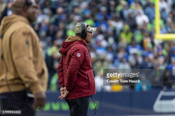 Ron Rivera of the Washington Commanders stand on the field against the Seattle Seahawk sat Lumen Field on November 12, 2023 in Seattle, Washington.