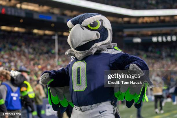 Blitz the mascot of the Seattle Seahawks cheers against the Washington Commanders at Lumen Field on November 12, 2023 in Seattle, Washington.