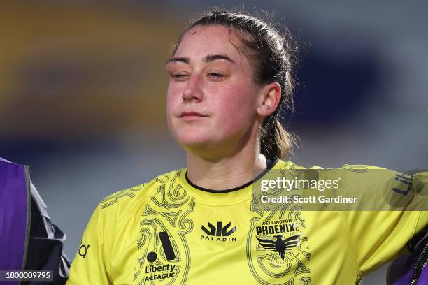 Hope Breslin of the Phoenix leaves the field following a collision during the A-League Women round five match between Central Coast Mariners and...