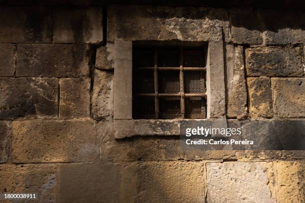 medieval wall of the cathedral of barcelona in the gothic quarter - barcelona cathedral stock pictures, royalty-free photos & images