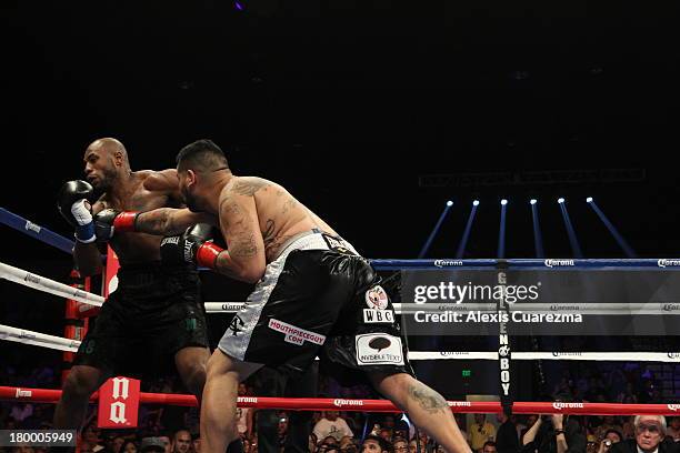 Chris Arreola lands a right against Seth Mitchell during their WBC International Heavyweight Title at the Fantasy Springs Resort Casino - Special...