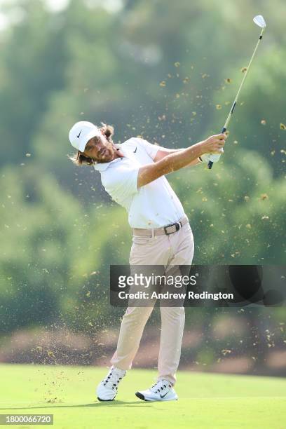 Tommy Fleetwood of England plays his second shot on the third hole during Day Three of the DP World Tour Championship on the Earth Course at Jumeirah...