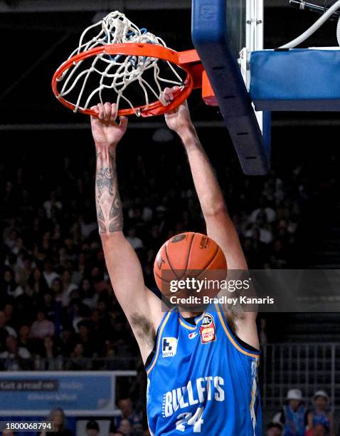 Tyrell Harrison of the Bullets slam dunks during the round eight NBL match between the Brisbane Bullets and Perth Wildcats at Nissan Arena, on...