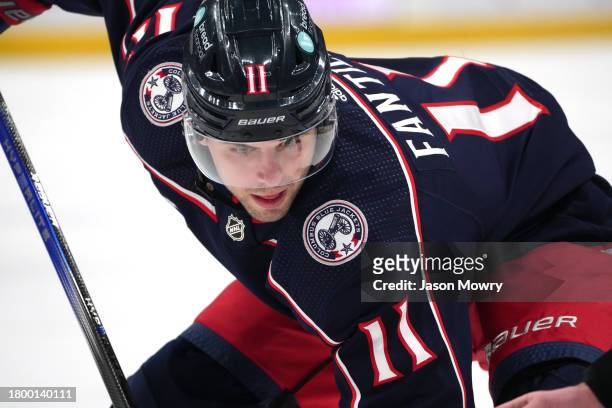 Adam Fantilli of the Columbus Blue Jackets awaits a face off during the second period against the Arizona Coyotes at Nationwide Arena on November 16,...