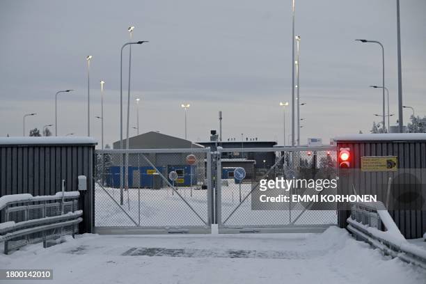Closed gates are seen at the Raja-Jooseppi international border crossing station before its opening in Inari, northern Finland on November 24, 2023....