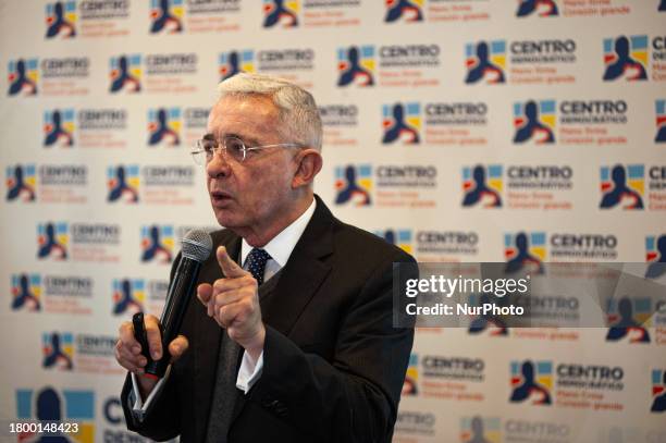 Colombia's former president Alvaro Uribe Velez is speaking during a press conference after a meeting with Colombia's President Gustavo Petro to...