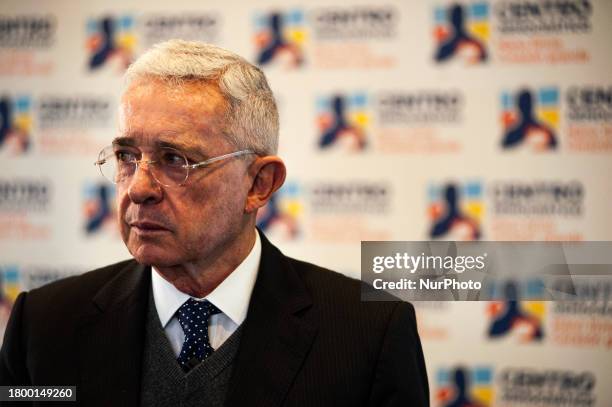 Colombia's former president Alvaro Uribe Velez is speaking during a press conference after a meeting with Colombia's President Gustavo Petro to...