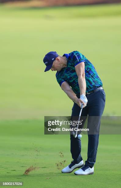 Matt Wallace of England plays his second shot one the 18th hole on his way to shooting his record ninth birdie in a row for a round of 12-under par...