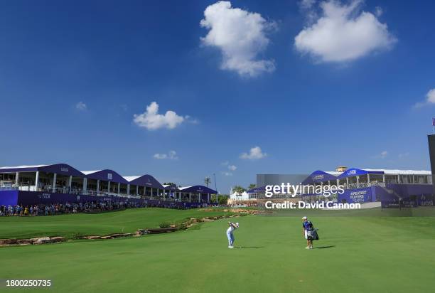 Matthew Fitzpatrick of England plays his third shot on the 18th hole during the third round on Day Three of the DP World Tour Championship on the...