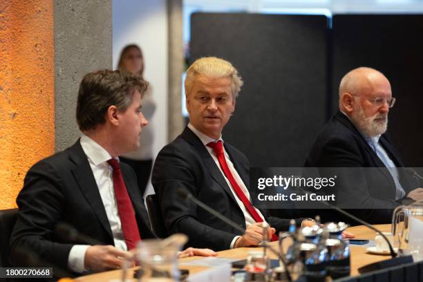 Geert Wilders , Dutch right-wing politician and leader of the Party for Freedom , sits next to Frans Timmermans , leader of the GroenLinks-PvdA...