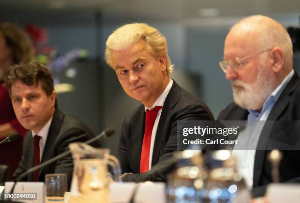 Geert Wilders , Dutch right-wing politician and leader of the Party for Freedom , sits next to Frans Timmermans , leader of the GroenLinks-PvdA...