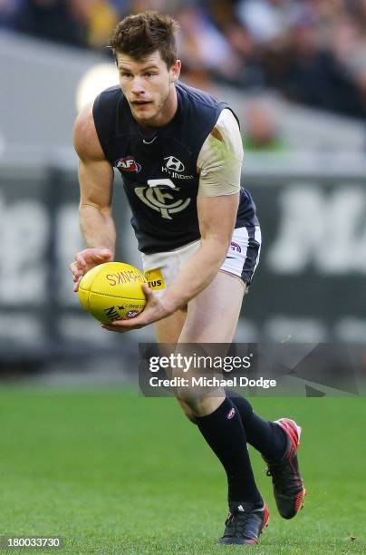 Bryce Gibbs of the Blues looks ahead with the ball during the First Elimination Final AFL match between the Richmond Tigers and the Carlton Blues at...