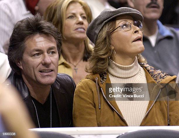 Actress Raquel Welch and husband Richard Palmer attend the game between the Los Angeles Lakers and the New York Knicks on February 16, 2003 at...