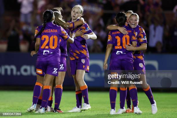 Hana Lowry of the Glory celebrates with team mates after scoring a goal during the A-League Women round five match between Perth Glory and Melbourne...